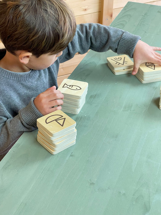 Wooden memory game with symbols