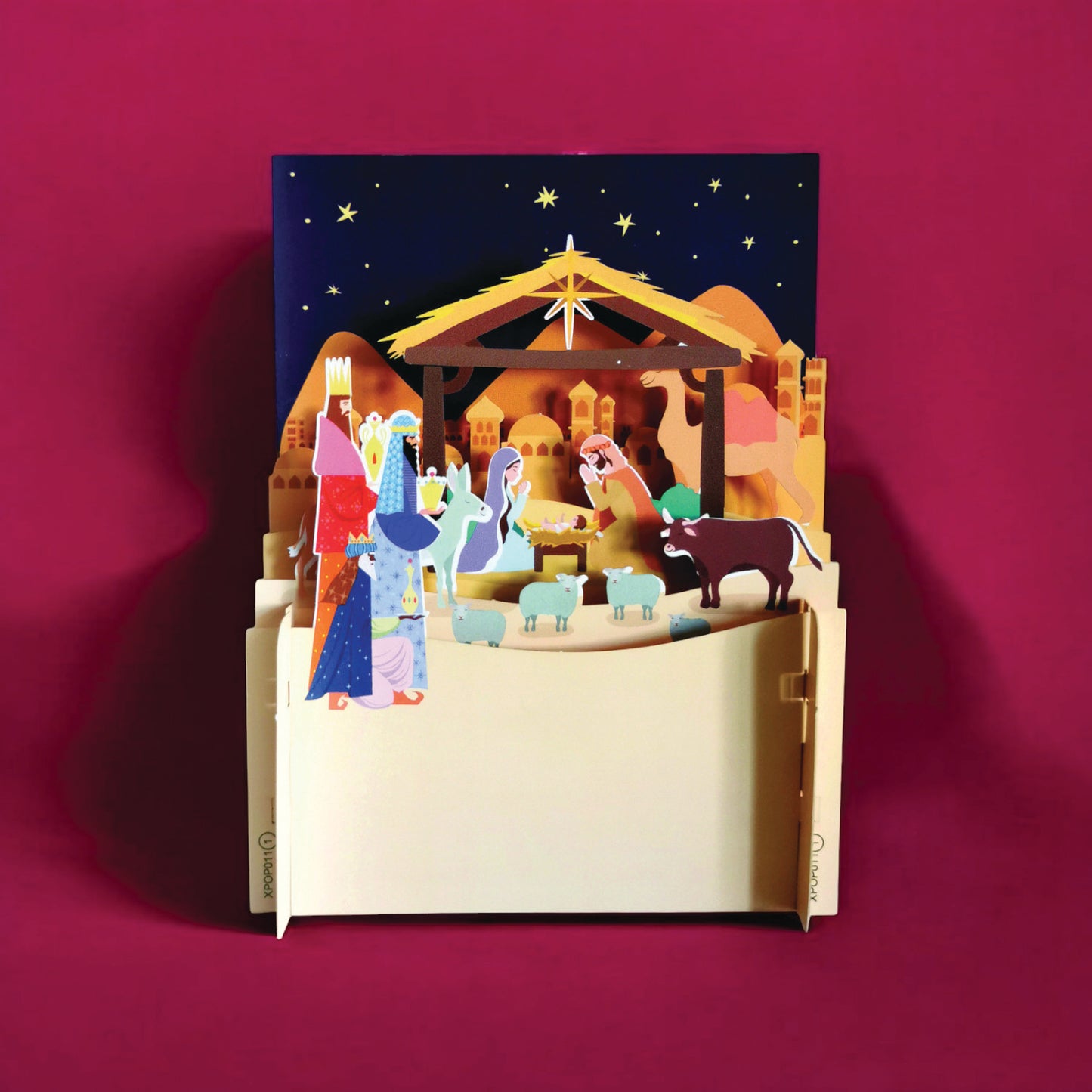 Pop-up greeting card with manger and three wise men